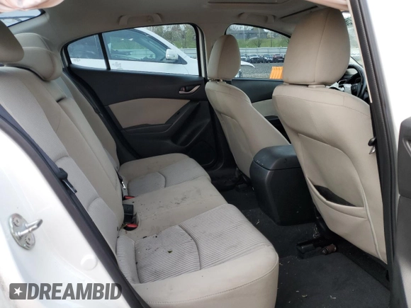 2016 Mazda 3 i Touring z VIN JM1BM1W70G1299548, wystawiony jako Copart lot #52575085 z przebiegiem 136 964 mil mil oraz Szkoda całkowita • Salvage title. Historia ofert i sprzedaży dostępna na DreamBid. Obrazek 10.