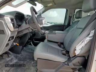2023 Ford F-150 XL с VIN 1FTEW1CP9PKG21142, выставлен на аукционе Copart как лот 63073825 с пробегом 18 539 миль миль и Списание • Salvage title. История ставок и продаж доступна на DreamBid. Изображение 7.