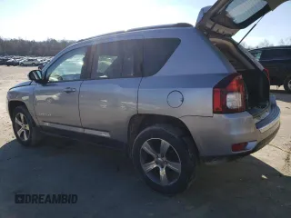 2016 Jeep Compass Latitude with VIN 1C4NJDEB2GD697923, listed as a Copart auction lot 84081394 with 167,240 mi miles and Salvage Title. Bid and sale history available at carsss.com. Image 2.