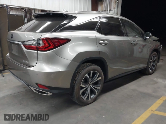 2022 Lexus RX 350 z VIN 2T2HZMDA9NC366292, wystawiony jako IAAI lot #42381449 z przebiegiem 26 717 mil mil oraz . Historia ofert i sprzedaży dostępna na DreamBid. Obrazek 4.