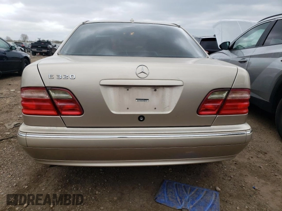2002 Mercedes-Benz E-Class with VIN WDBJF65J12B463150, listed as a Copart auction lot 74434654 with 215,883 mi miles and Salvage Title. Bid and sale history available at carsss.com. Image 6.