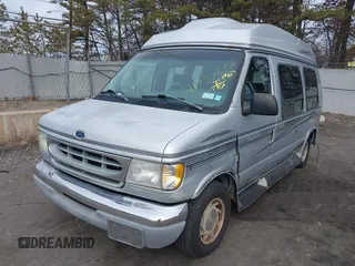 1999 Ford Econoline Cargo z VIN 1FDRE14W1XHA40091, wystawiony jako IAAI lot #41730882 z przebiegiem 221 505 mil mil oraz . Historia ofert i sprzedaży dostępna na DreamBid. Obrazek 2.