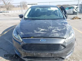 2016 Ford Focus SE with VIN 1FADP3F2XGL317130, listed as a IAAI auction lot 41970029 with 85,241 mi miles and . Bid and sale history available at DreamBid. Image 12.
