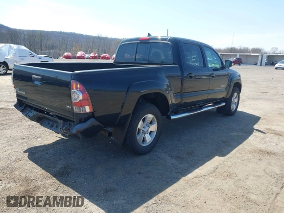 2015 Toyota Tacoma with VIN 3TMMU4FN7FM085666, listed as a IAAI auction lot 42051241 with 224,513 mi miles and . Bid and sale history available at DreamBid. Image 4.