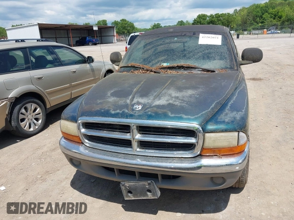 1998 Dodge Dakota SLT with VIN 1B7GL22X4WS554408, listed as a IAAI auction lot 42202021 with 147,765 mi miles. Bid and sale history available at carsss.com. Image 6.
