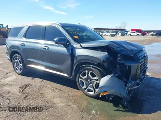 2024 Hyundai Palisade Limited z VIN KM8R54GE6RU762168, wystawiony jako IAAI lot #41636936 z przebiegiem 12 236 mil mil oraz . Historia ofert i sprzedaży dostępna na DreamBid. Obrazek 1.