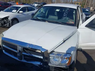 2007 Dodge Dakota SLT z VIN 1D7HW48JX7S166780, wystawiony jako IAAI lot #41375942 z przebiegiem 148 778 mil mil oraz . Historia ofert i sprzedaży dostępna na DreamBid. Obrazek 10.