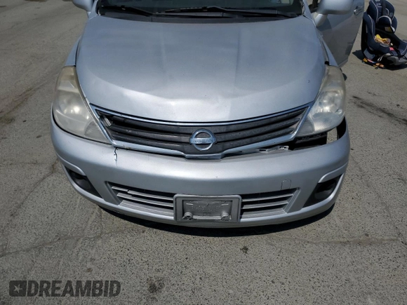 2010 Nissan Versa S with VIN 3N1BC1CP1AL408030, listed as a Copart auction lot 59906325 with 125,243 mi miles and Salvage title. Bid and sale history available at DreamBid. Image 11.