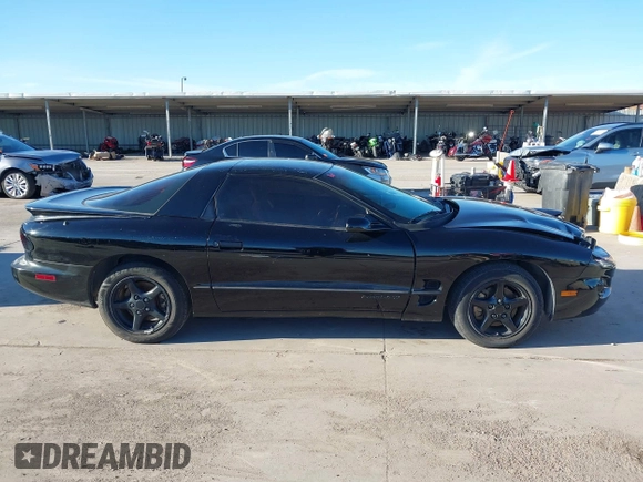 2002 Pontiac Firebird Firebird z VIN 2G2FS22K022109417, wystawiony jako IAAI lot #41199057 z przebiegiem 124 463 mil mil oraz . Historia ofert i sprzedaży dostępna na DreamBid. Obrazek 13.