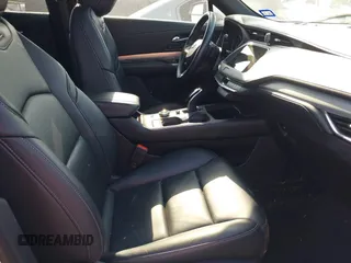 2022 Cadillac XT4 FWD Premium Luxury с VIN 1GYFZCR48NF138181, выставлен на аукционе IAAI как лот 42187527 с пробегом Не указан миль и . История ставок и продаж доступна на DreamBid. Изображение 5.