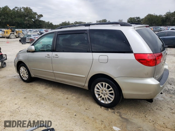 2009 Toyota Sienna XLE with VIN 5TDBK22C89S027706, listed as a Copart auction lot 88672015 with 215,515 mi miles and Salvage Title. Bid and sale history available at DreamBid. Image 2.