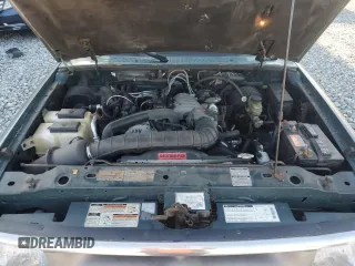 1996 Ford Ranger XL z VIN 1FTCR10U8TUB52746, wystawiony jako Copart lot #52148355 z przebiegiem 139 890 mil mil oraz Szkoda całkowita • Salvage title. Historia ofert i sprzedaży dostępna na DreamBid. Obrazek 11.