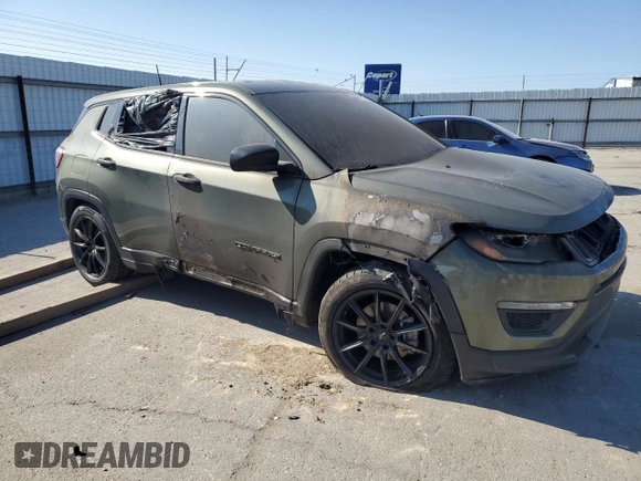 2019 Jeep Compass Sport with VIN 3C4NJCAB5KT731193, listed as a Copart auction lot 57356565 with Not provided miles and Salvage title. Bid and sale history available at DreamBid. Image 4.