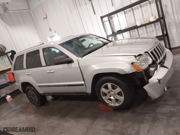 2008 Jeep Grand Cherokee Laredo with VIN 1J8GR48K88C108967, listed as a IAAI auction lot 41306142 with 190,786 mi miles. Bid and sale history available at carsss.com. Image 13.