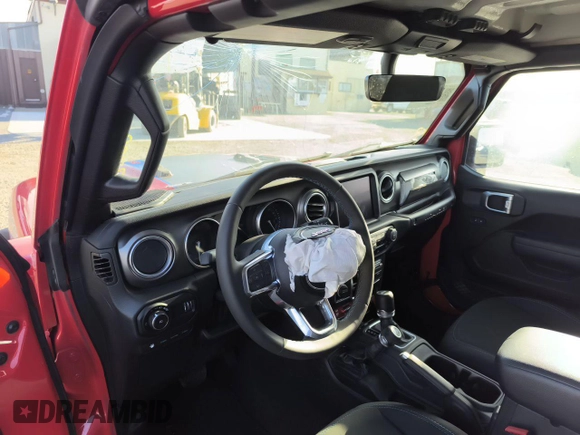 2023 Jeep Wrangler Rubicon with VIN 1C4JJXR69PW695846, listed as a Copart auction lot 57472885 with 17,239 mi miles and Clean title. Bid and sale history available at DreamBid. Image 7.