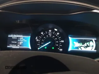 2013 Ford Fusion SE Hybrid with VIN 3FA6P0LU8DR357054, listed as a IAAI auction lot 42372168 with 143,979 mi miles and . Bid and sale history available at DreamBid. Image 7.