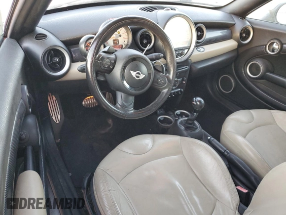 2013 MINI Roadster S z VIN WMWSY3C55DT594614, wystawiony jako Copart lot #87357464 z przebiegiem 119 449 mil mil oraz Tytuł czysty. Historia ofert i sprzedaży dostępna na DreamBid. Obrazek 8.