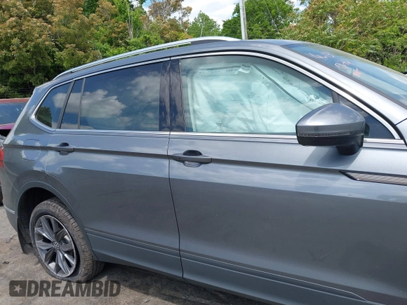 2022 Volkswagen Tiguan SE with VIN 3VV3B7AX9NM089164, listed as a IAAI auction lot 42065583 with 59,270 mi miles and . Bid and sale history available at DreamBid. Image 13.