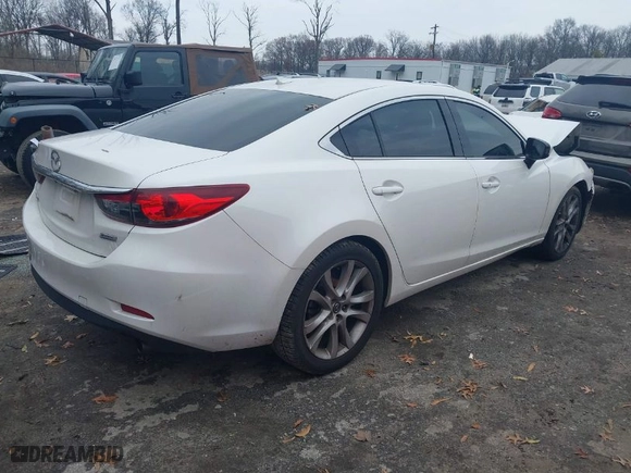 2015 Mazda Mazda6 i Touring with VIN JM1GJ1V66F1173314, listed as a IAAI auction lot 41101860 with 160,338 mi miles. Bid and sale history available at carsss.com. Image 4.
