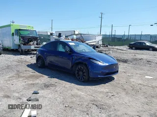 2023 Tesla Model Y Performance z VIN 7SAYGDEF4PF844933, wystawiony jako IAAI lot #42048999 z przebiegiem Nie podano mil oraz . Historia ofert i sprzedaży dostępna na DreamBid. Obrazek 1.