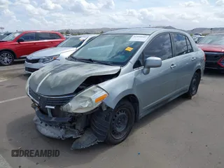 2009 Nissan Versa 1.8 S with VIN 3N1BC11E39L381507, listed as a IAAI auction lot 41956643 with 120,730 mi miles. Bid and sale history available at carsss.com. Image 18.