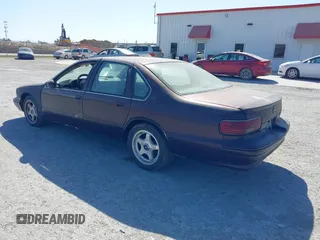 1996 Chevrolet Caprice Classic 1SA Special Value Pkg with VIN 1G1BL52P9TR184810, listed as a IAAI auction lot 41831242 with 1 mi miles. Bid and sale history available at carsss.com. Image 3.