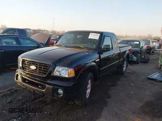 2009 Ford Ranger XL with VIN 1FTZR15E79PA68856, listed as a IAAI auction lot 41784829 with 153,928 mi miles. Bid and sale history available at carsss.com. Image 2.