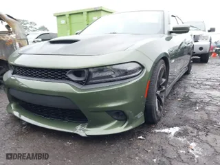 2021 Dodge Charger Scat Pack with VIN 2C3CDXGJ8MH616219, listed as a IAAI auction lot 41394474 with 59,434 mi miles. Bid and sale history available at carsss.com. Image 6.