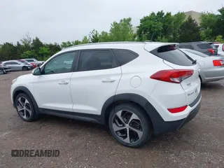 2016 Hyundai Tucson Limited with VIN KM8J33A23GU215481, listed as a IAAI auction lot 42202341 with 97,693 mi miles. Bid and sale history available at carsss.com. Image 14.