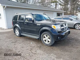 2007 Dodge Nitro SLT with VIN 1D8GU58K37W609100, listed as a IAAI auction lot 41650000 with 176,860 mi miles. Bid and sale history available at carsss.com. Image 1.
