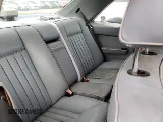 1988 Mercedes-Benz 300 with VIN WDBEA50D4JA612702, listed as a Copart auction lot 54090305 with 104,558 mi miles and Clean Title. Bid and sale history available at DreamBid. Image 10.