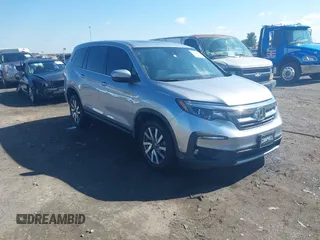2019 Honda Pilot EX-L z VIN 5FNYF6H55KB050627, wystawiony jako IAAI lot #42209892 z przebiegiem 74 442 mil mil oraz . Historia ofert i sprzedaży dostępna na DreamBid. Obrazek 1.