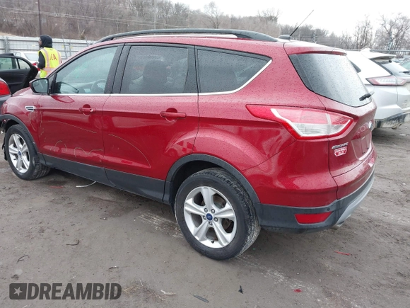 2014 Ford Escape SE with VIN 1FMCU9GX7EUC35483, listed as a IAAI auction lot 41704298 with 105,017 mi miles. Bid and sale history available at carsss.com. Image 3.