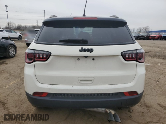 2019 Jeep Compass Altitude with VIN 3C4NJCBB4KT618673, listed as a Copart auction lot 51801955 with 104,784 mi miles and Salvage title. Bid and sale history available at DreamBid. Image 6.