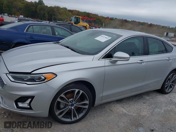 2019 Ford Fusion Titanium with VIN 3FA6P0K96KR120749, listed as a IAAI auction lot 40737085 with 118,376 mi miles and . Bid and sale history available at DreamBid. Image 17.