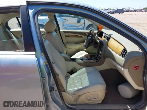 2004 Jaguar S-Type with VIN SAJEA01T94FN04630, listed as a IAAI auction lot 42033159 with 117,715 mi miles and . Bid and sale history available at DreamBid. Image 5.