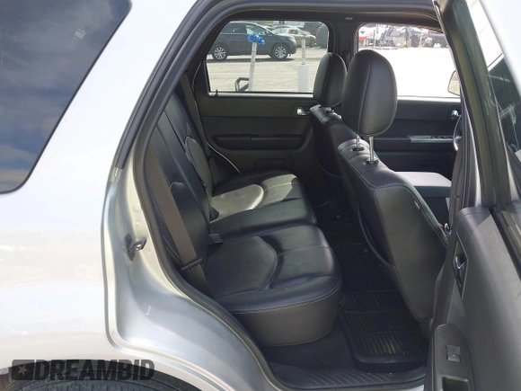 2008 Mercury Mariner Premier with VIN 4M2CU97198KJ12620, listed as a IAAI auction lot 41909389 with 131,884 mi miles and . Bid and sale history available at DreamBid. Image 8.