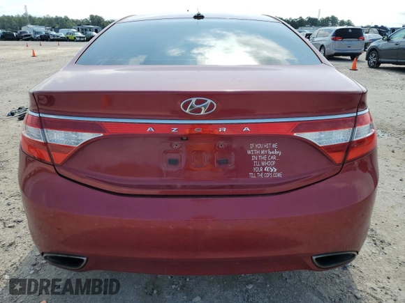 2013 Hyundai Azera with VIN KMHFG4JGXDA227359, listed as a Copart auction lot 52868574 with 129,811 mi miles and Salvage Title. Bid and sale history available at DreamBid. Image 6.
