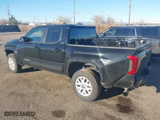 2024 Toyota Tacoma 2WD SR5 with VIN 3TMKB5FN0RM011416, listed as a IAAI auction lot 41303796 with 9,923 mi miles. Bid and sale history available at carsss.com. Image 3.