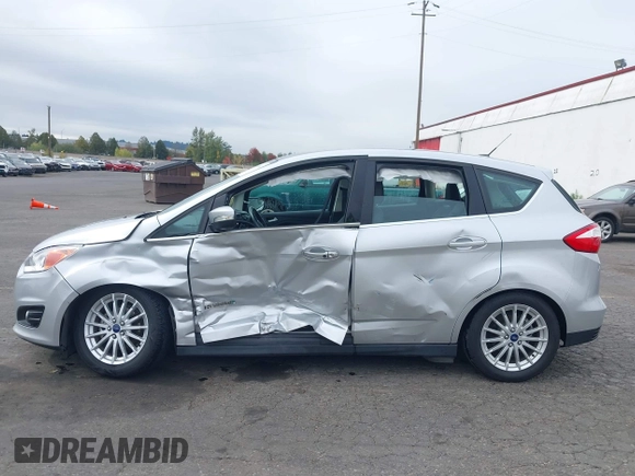2014 Ford C-Max SEL z VIN 1FADP5BU7EL511677, wystawiony jako IAAI lot #40554962 z przebiegiem 63 031 mil mil oraz . Historia ofert i sprzedaży dostępna na DreamBid. Obrazek 13.