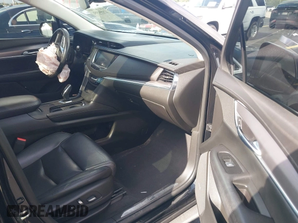 2017 Cadillac XT5 Luxury FWD with VIN 1GYKNBRS5HZ106391, listed as a IAAI auction lot 42494351 with 67,445 mi miles and . Bid and sale history available at DreamBid. Image 5.