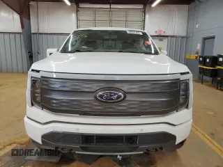 2023 Ford F-150 Lightning Pro with VIN 1FTVW1EL1PWG05889, listed as a Copart auction lot 48022435 with 20,904 mi miles and Salvage Title. Bid and sale history available at DreamBid. Image 5.