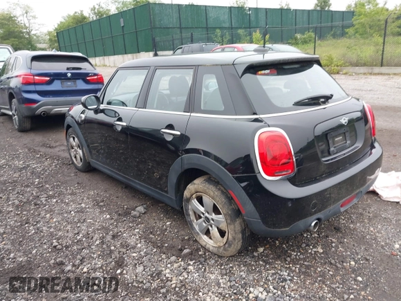 2020 MINI Hardtop 4 Door Cooper with VIN WMWXU7C04L2L58635, listed as a IAAI auction lot 42383785 with 27,160 mi miles and . Bid and sale history available at DreamBid. Image 3.