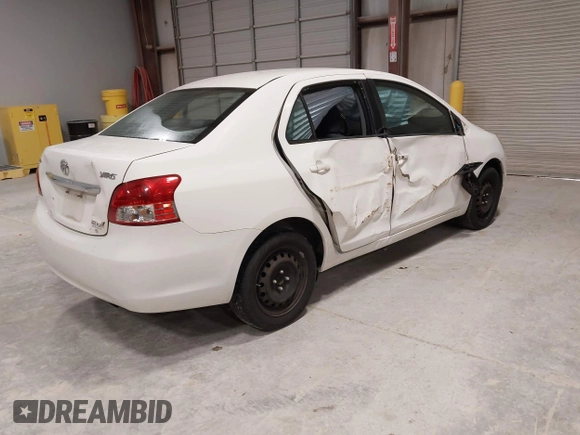 2009 Toyota Yaris with VIN JTDBT903994054207, listed as a IAAI auction lot 41991534 with 176,820 mi miles. Bid and sale history available at carsss.com. Image 4.