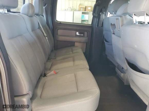 2014 Ford F-150 XL with VIN 1FTFW1ET0EKE07328, listed as a Copart auction lot 47490645 with 222,881 mi miles and Salvage Title. Bid and sale history available at carsss.com. Image 10.