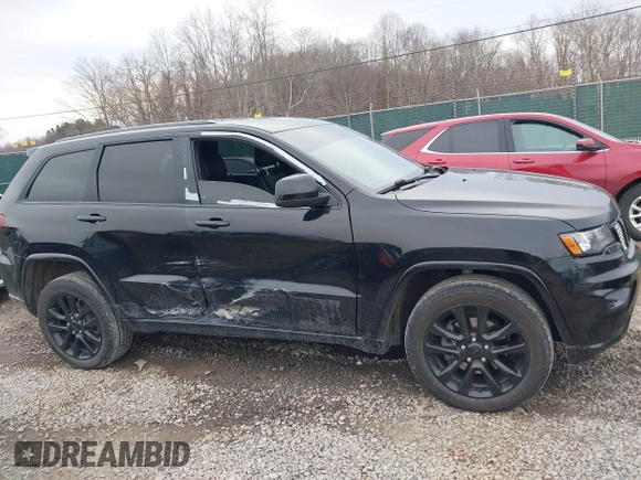 2017 Jeep Grand Cherokee Laredo with VIN 1C4RJFAG9HC882251, listed as a IAAI auction lot 41696710 with 129,627 mi miles and . Bid and sale history available at DreamBid. Image 13.