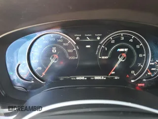 2018 BMW M5 z VIN WBSJF0C51JB282030, wystawiony jako Copart lot #54773835 z przebiegiem 44 046 mil mil oraz Szkody całkowita. Historia ofert i sprzedaży dostępna na DreamBid. Obrazek 9.