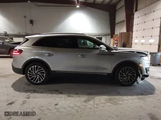 2019 Lincoln Nautilus Reserve with VIN 2LMPJ8LP4KBL25142, listed as a IAAI auction lot 41340444 with 105,757 mi miles. Bid and sale history available at carsss.com. Image 13.
