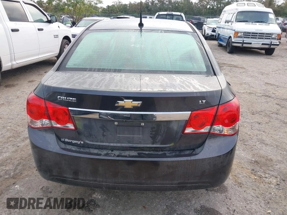 2014 Chevrolet Cruze 1LT z VIN 1G1PC5SB9E7446821, wystawiony jako IAAI lot #40723456 z przebiegiem 137 378 mil mil oraz . Historia ofert i sprzedaży dostępna na DreamBid. Obrazek 17.