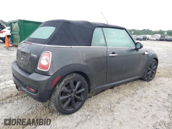 2013 MINI Convertible S с VIN WMWZP3C58DT550592, выставлен на аукционе Copart как лот 56250685 с пробегом 141 821 миль миль и Списание • Salvage title. История ставок и продаж доступна на DreamBid. Изображение 3.